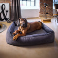 Load image into Gallery viewer, LABONI Buffalo orthopedic dog bed, shown in living room setting
